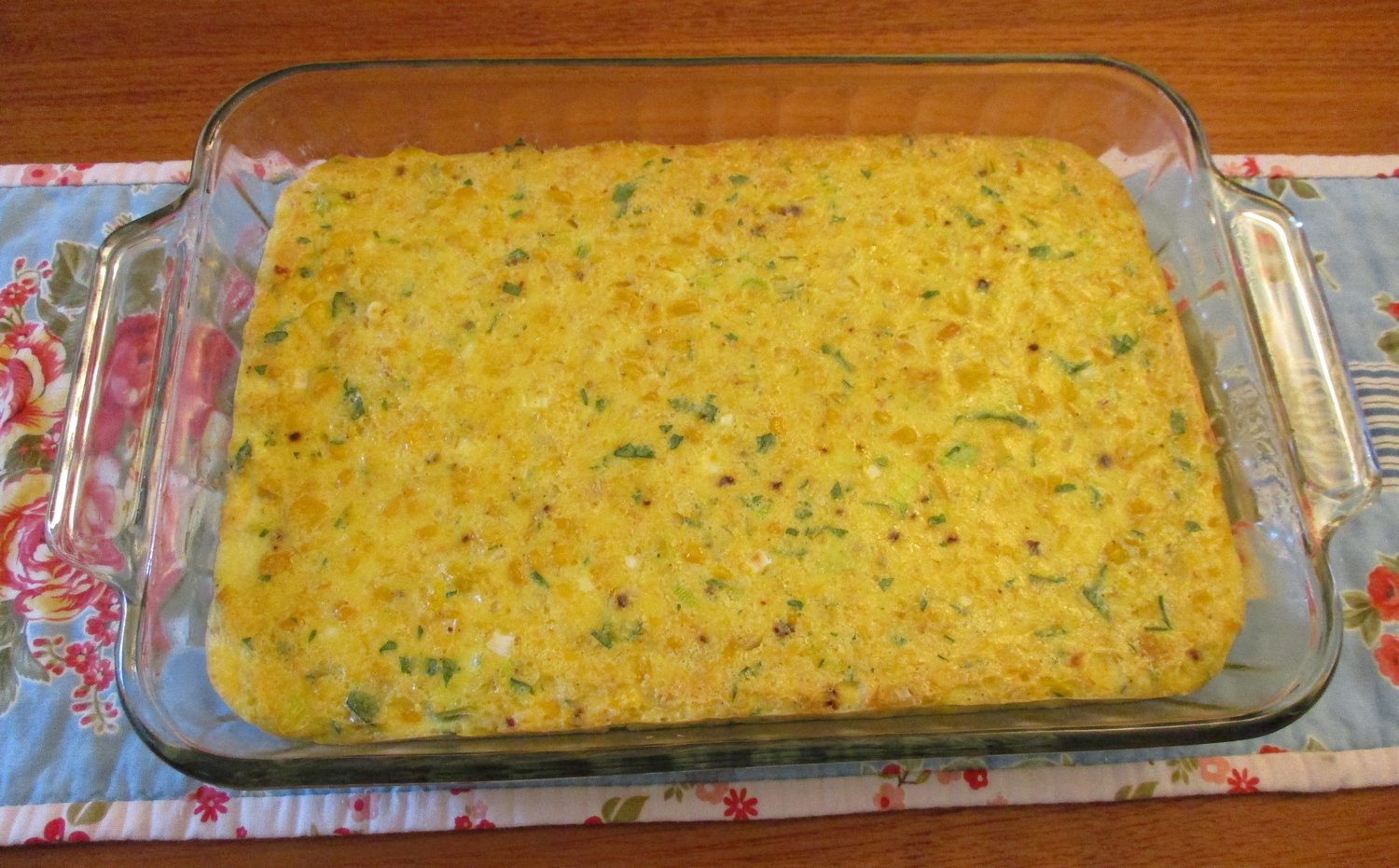 The completed savory corn pudding.